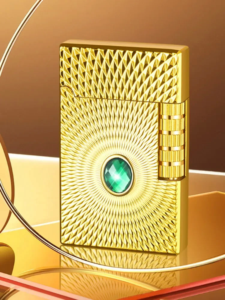 Luxury gas lighter in gold with decorative stone (green). With flint.