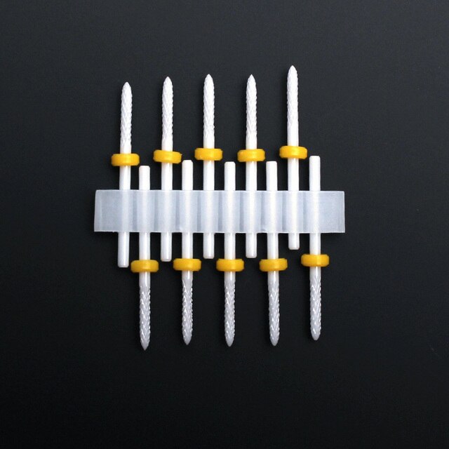 Nail cutter bits made of ceramic. Cutter attachment, grinding head attachment drill, drill.